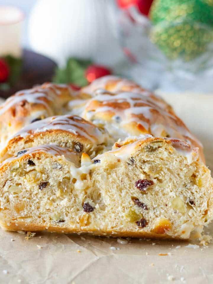 sliced stollen bread on parchment paper.